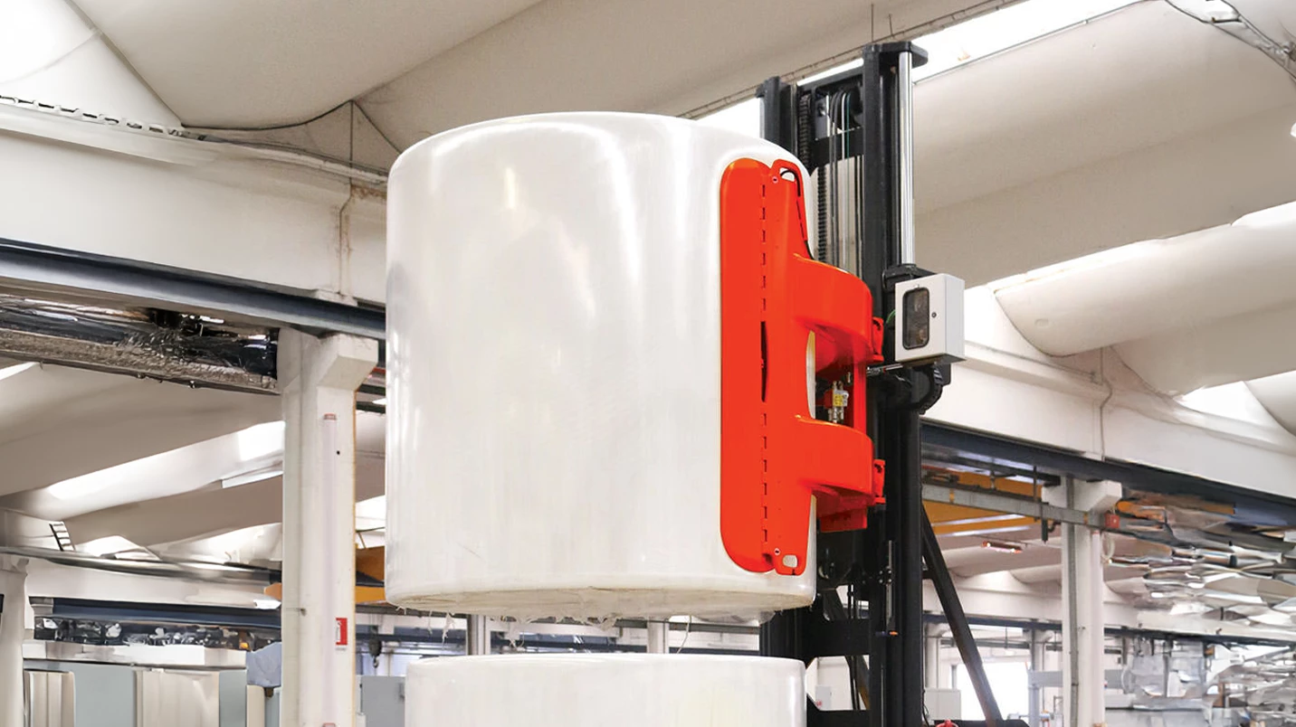 Bolzoni clamp attachment on automated lift truck.