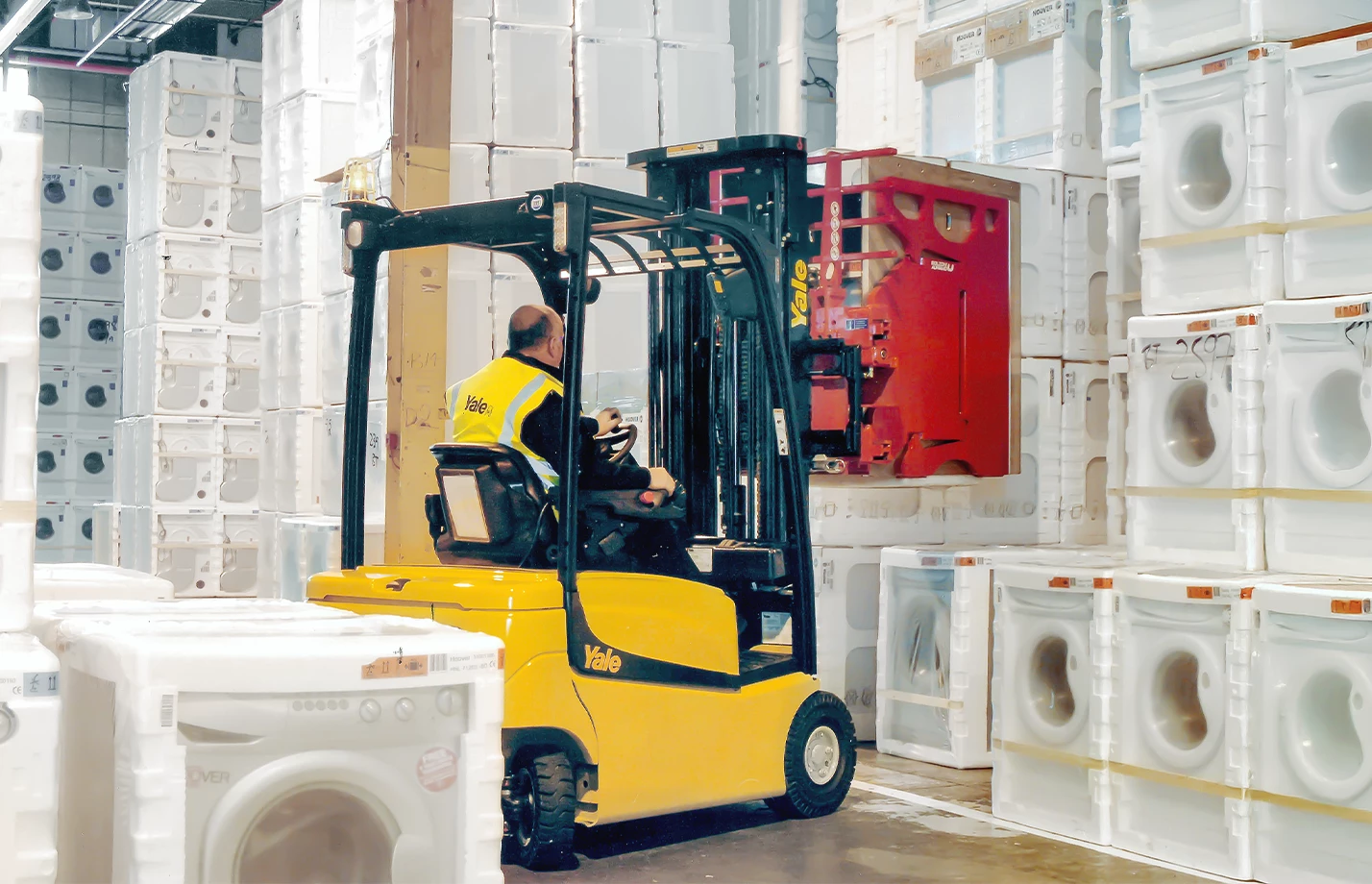 Bolzoni appliance clamp attachment on Yale lift truck.