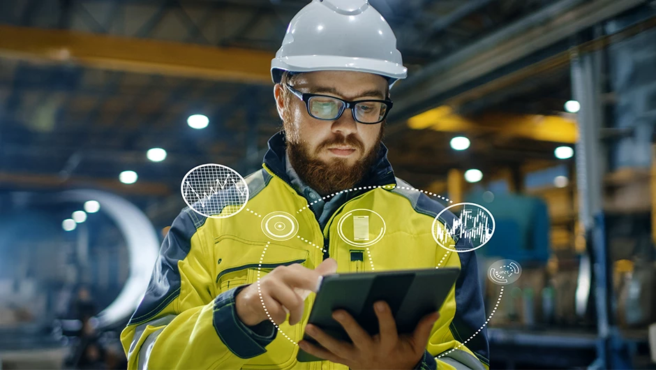 Man looking at telemetry fleet data on an iPad.